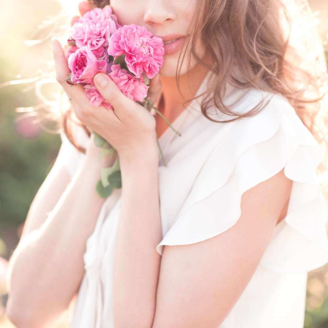 the perfect gift, woman holding flowers