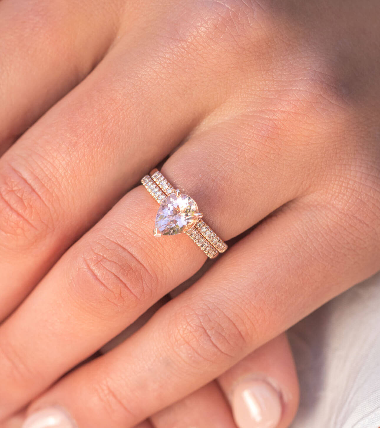 A Look at Our Best Pear Engagement Rings: Woman wearing a pear shaped ring