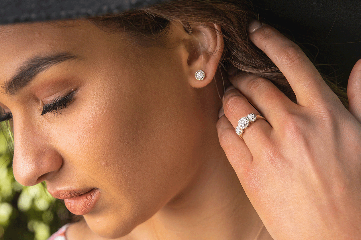 A Guide To Our Favourite Dainty Jewellery: image of an earring and ring on model