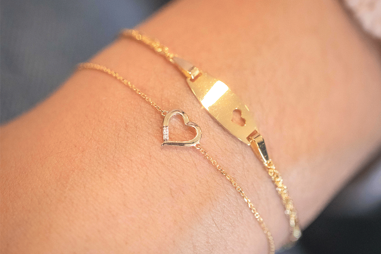 A Guide To Our Favourite Dainty Jewellery: image of bracelets on hand