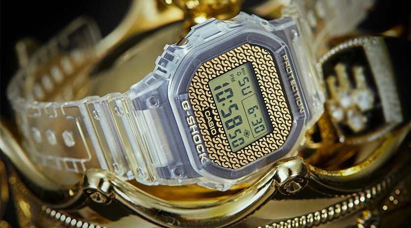 Step Up Your Street Style Game With The New G-Shock DWE5600HG-1 Gold Chain Watch | Case & Bezel