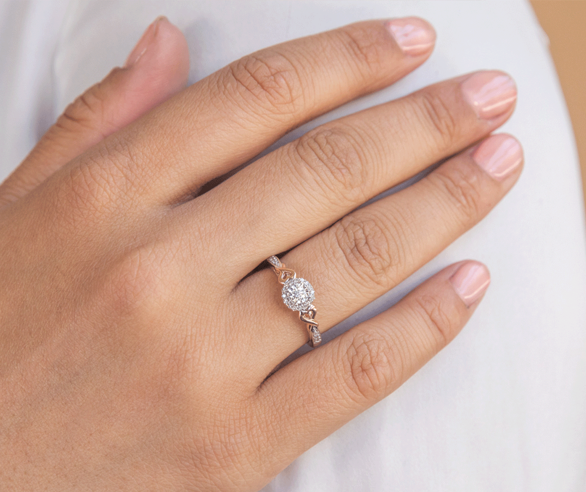 best Sapphire Engagement Rings: cluster ring on finger