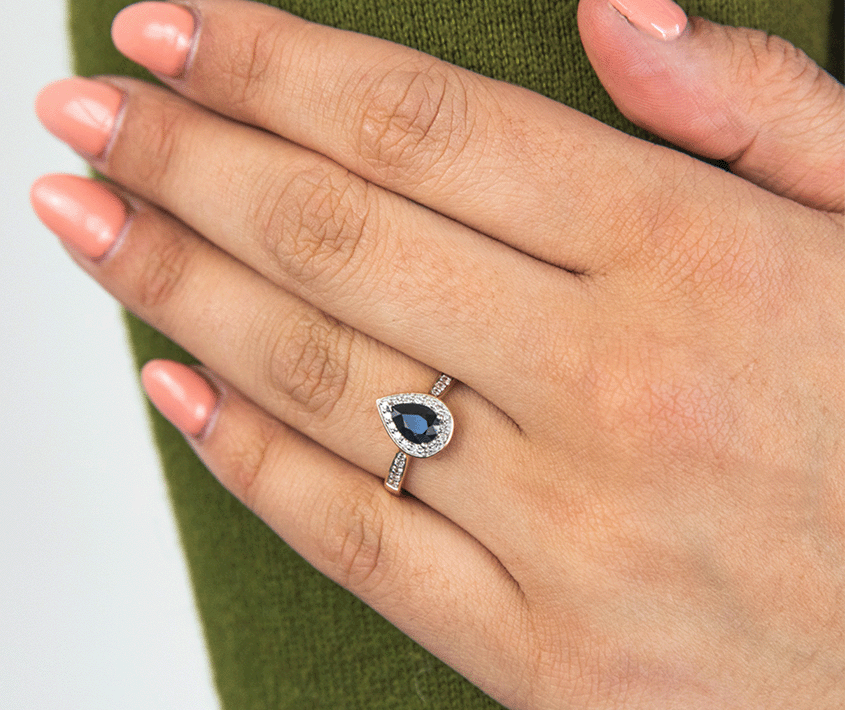  best Sapphire Engagement Rings: ring on finger