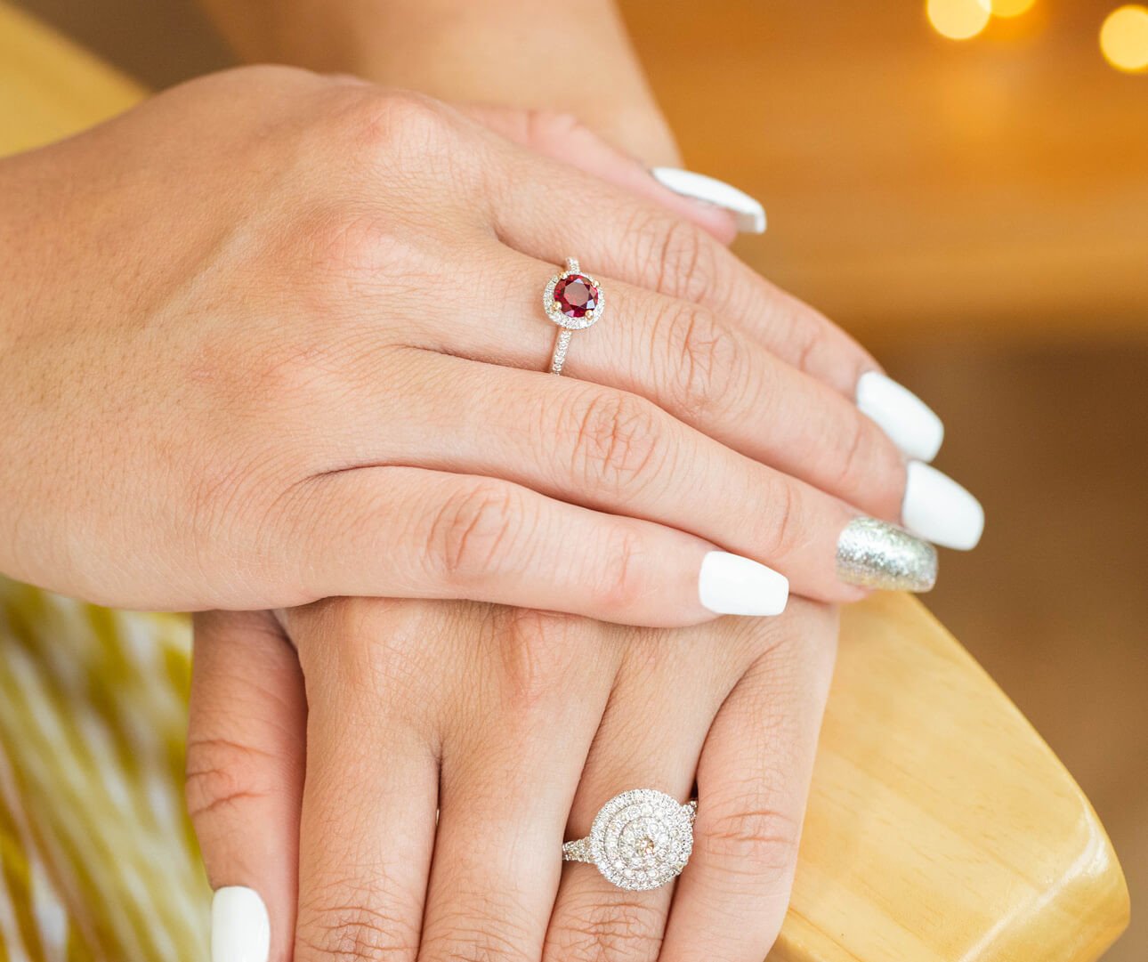 How To Wear Your Wedding Rings: Image of ruby wedding ring on finger